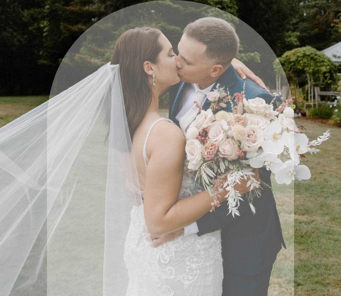 Сouple wearing a white gown and a black suit