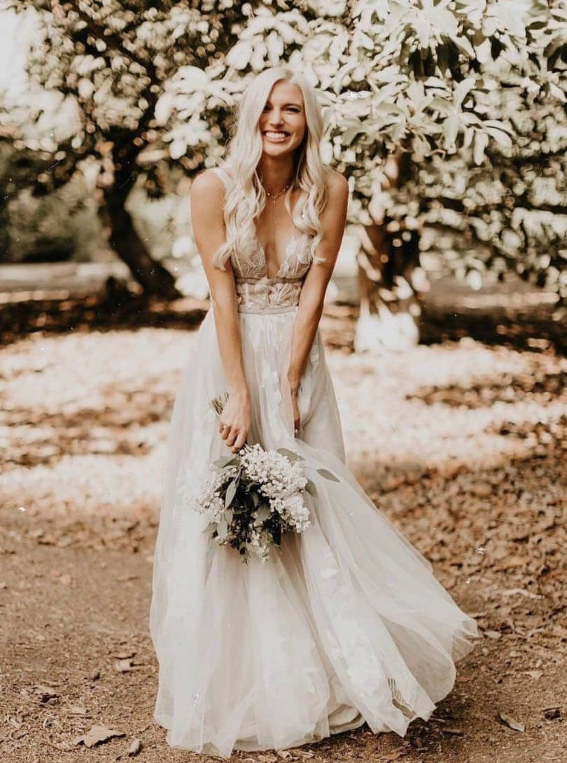 Model wearing a white gown